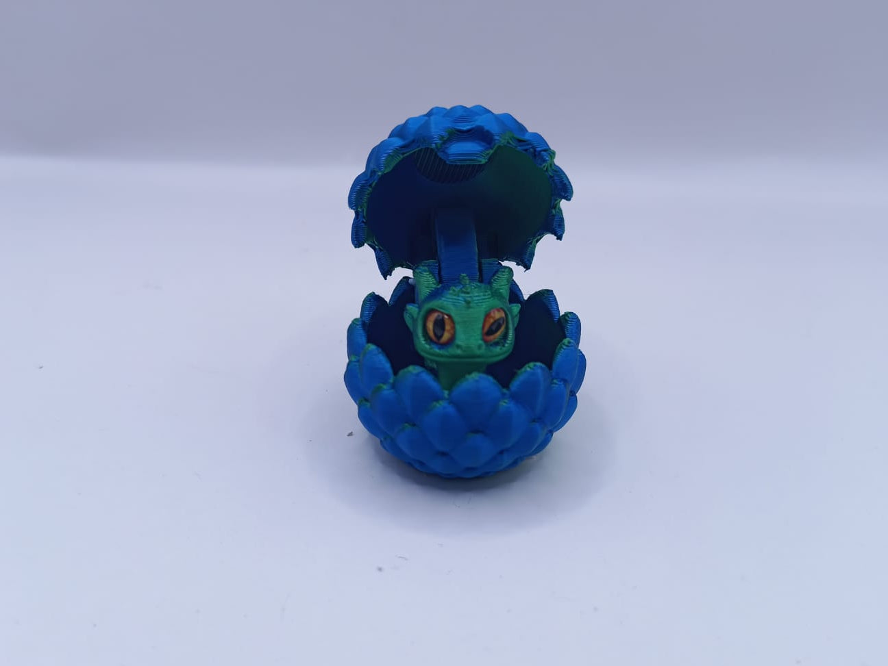 Blue Opening Egg with Baby Dragon