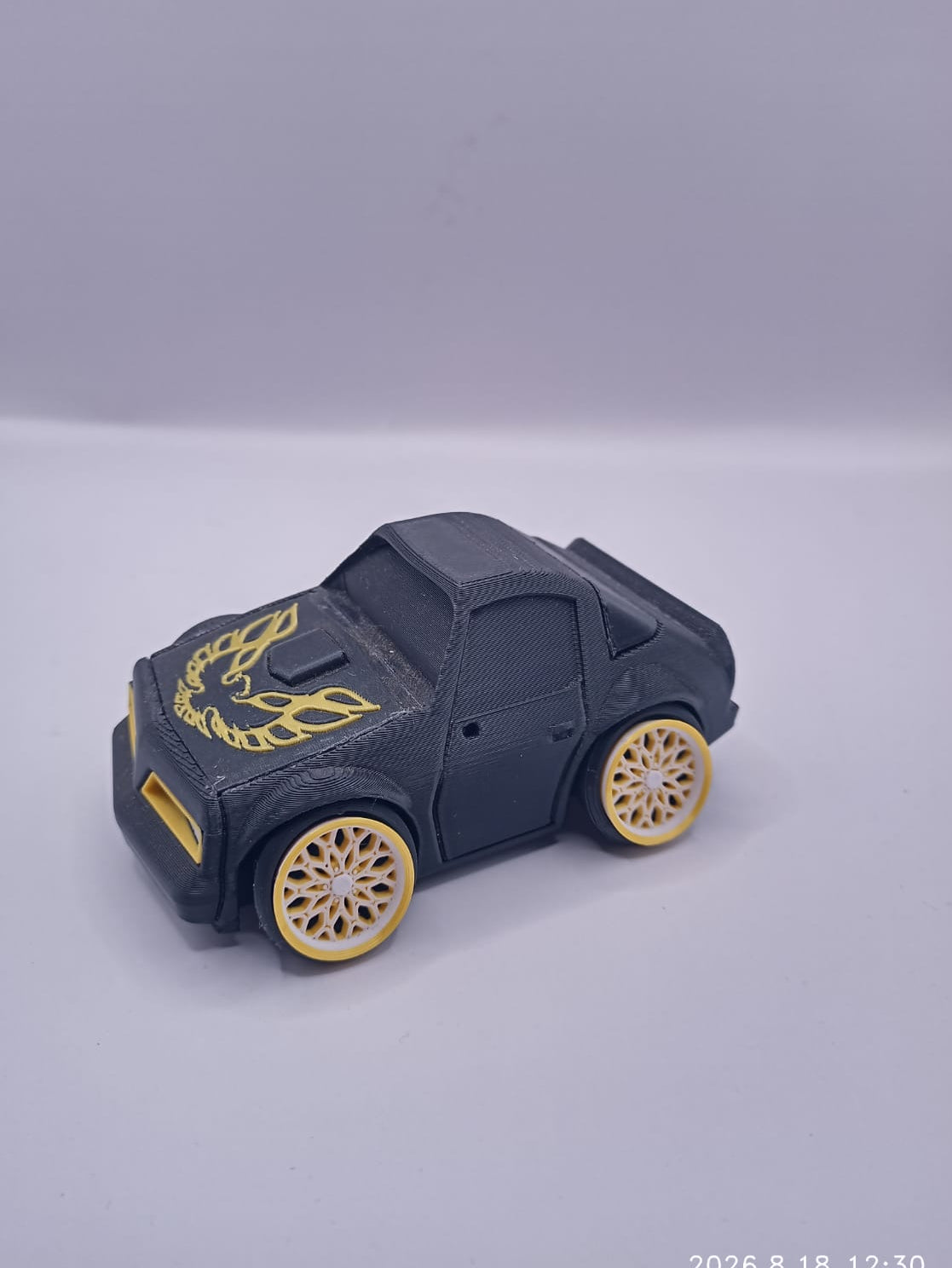 Black Car with Yellow Design
